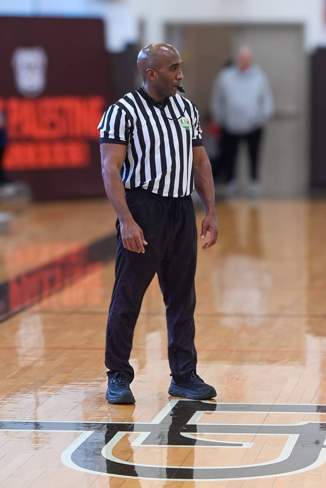 Wayne Penny Jr. officiating a local basketball game